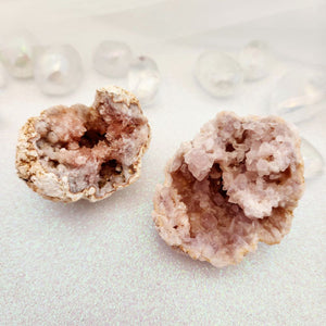 Small Pink Amethyst geode with pale blush tones and sparkling druzy cavity.