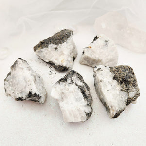 Rainbow Moonstone crystal rough rock with iridescent flash, supporting intuition and emotional balance