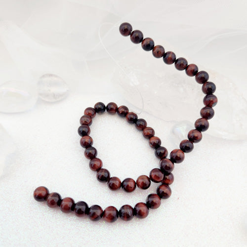 Red Tiger's Eye Bead Strand (enhanced. assorted. round. approx. 46 x 8mm)