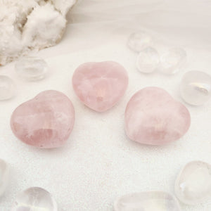 Polished Rose Quartz heart with soft pink tones and gentle translucence.