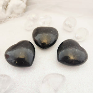 Polished black Shungite heart with smooth matte finish.