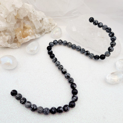 Snowflake Obsidian Bead Strand (approx. 47-49x8mm round beads)