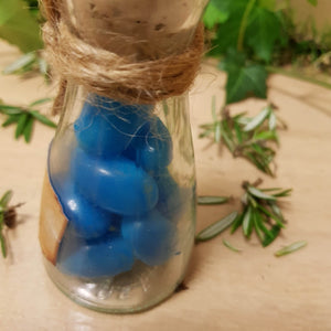 Bottled Poop of a Proud Peacock (assorted medium) from The Potion Master