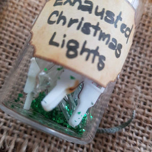 Bottled Exhausted Christmas Lights (assorted small) from The Potion Master