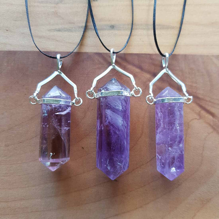 Amethyst Point Pendant. (assorted set in silver metal)