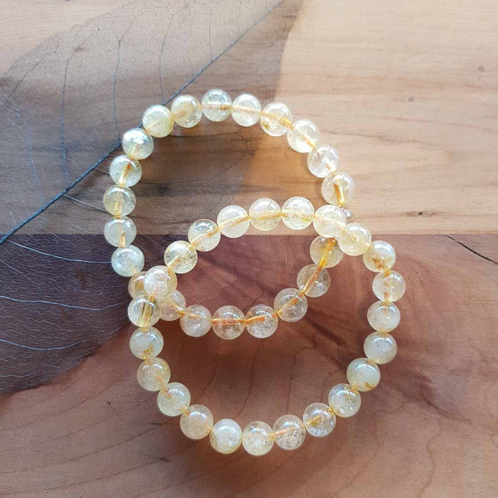 Citrine Bracelet (heat treated. assorted. approx. 8mm round beads)