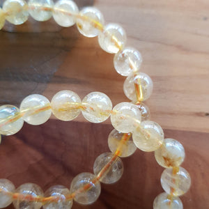 Citrine Bracelet (heat treated. assorted. approx. 8mm round beads)