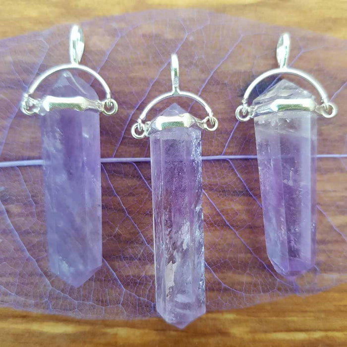 Amethyst Point Pendant. (assorted. sterling silver swing setting)