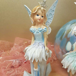 Blue Winter Fairy on Icicles. (approx 19x7.5cm)