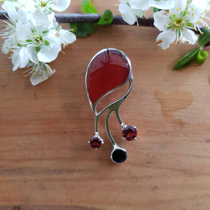 Red Agate, Onyx & Garnet Pendant. (set in sterling silver)