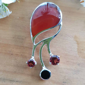 Red Agate, Onyx & Garnet Pendant. (set in sterling silver)