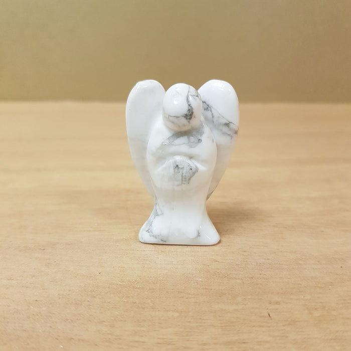 Howlite Angel. (assorted approx. 4x3cm)