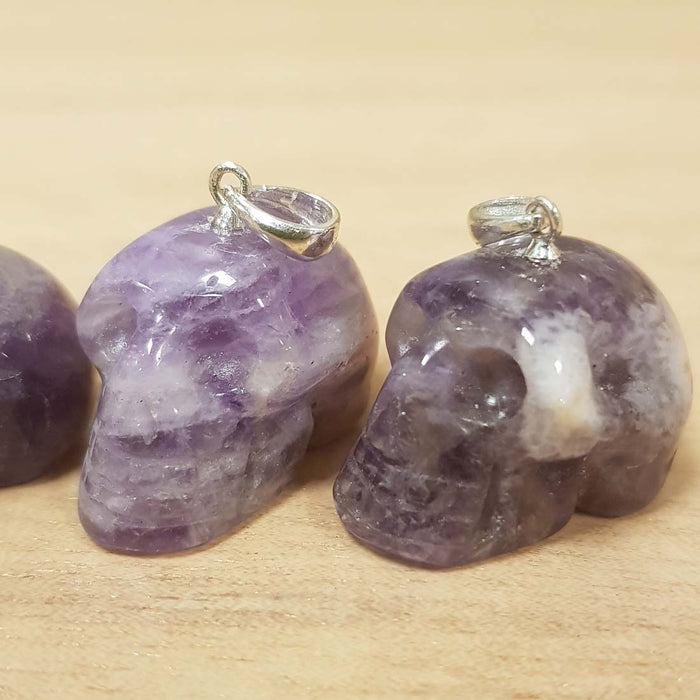 Amethyst Skull Pendant. (assorted. approx. 1.5x2cm silver metal bale)