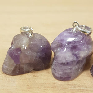 Amethyst Skull Pendant. (assorted. approx. 1.5x2cm silver metal bale)