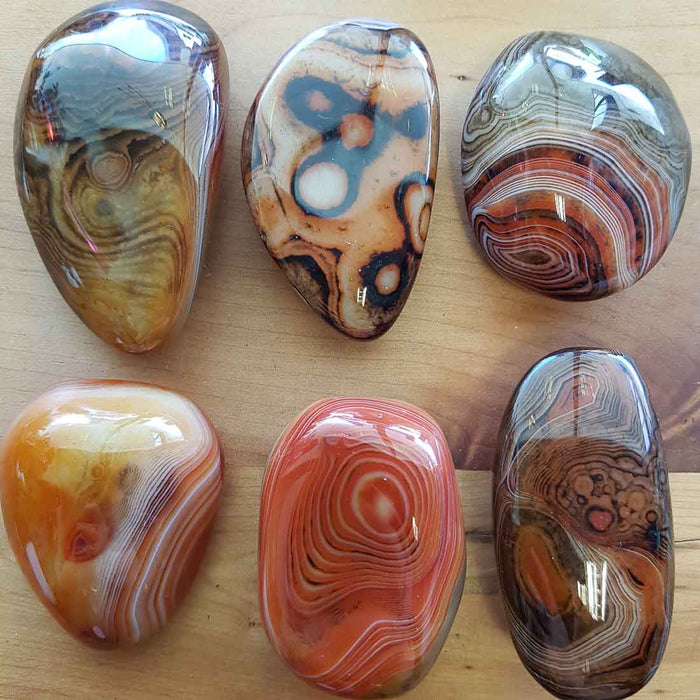 Agate/Carnelian Palm Stone from Madagascar (assorted. approx.5-6.1x3-4..8cm)