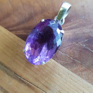 Amethyst Faceted Oval Pendant. (set in sterling silver)