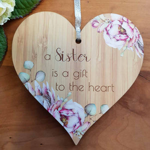 A Sister is a Gift Heart Wall Plaque. (approx. 15x15cm)