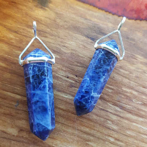 Sodalite Point Pendant. (assorted. set in sterling silver)