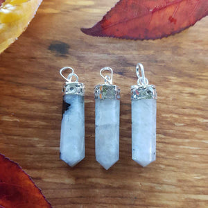 Rainbow Moonstone Pencil Point Pendant. (assorted. set in metal cap)