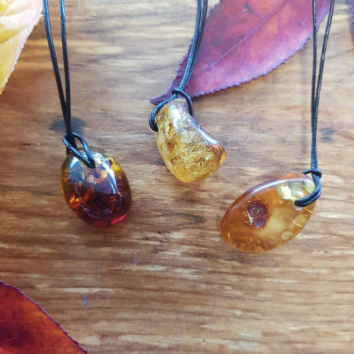Baltic Amber Pendant. (partially polished. assorted)