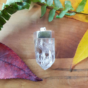 Clear Quartz Chunky Point Pendant. (set in silver metal cap)