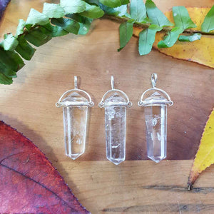 Clear Quartz Point Pendant. (assorted. set in sterling silver)