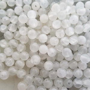 Selenite Bead (assorted. round. approx. 6mm)