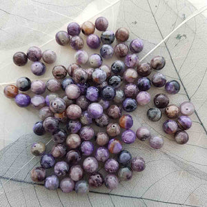 Charoite Bead (assorted. round. approx. 8mm)