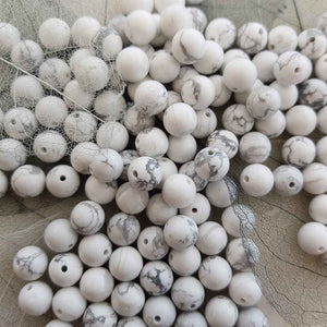 Howlite Bead (assorted. round. approx. 8mm)