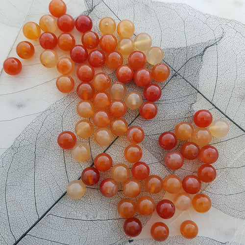 Carnelian Bead (assorted. round. approx. 8mm)