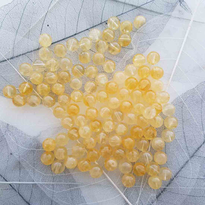 Citrine Bead (heat treated. assorted. approx. 8mm round)