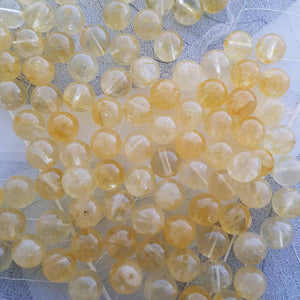 Citrine Bead (heat treated. assorted. approx. 8mm round)