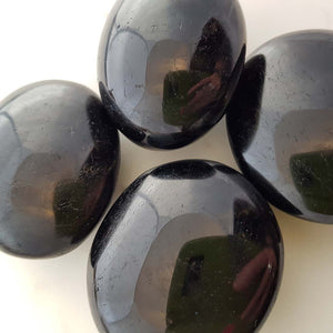 Black Tourmaline Palm Stone (assorted. approx. 5-6x2-3m)