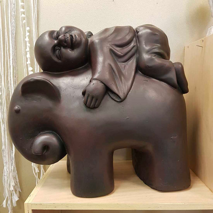 Buddhist Monk on Elephant (approx. 46x51x22cm)