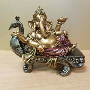 Ganesh Reclining on Peacock Seat (approx. 15x18cm)