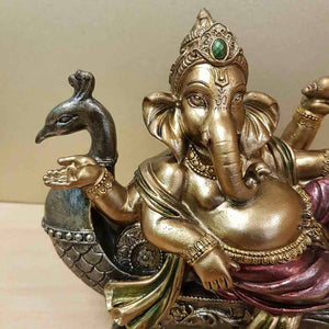 Ganesh Reclining on Peacock Seat (approx. 15x18cm)