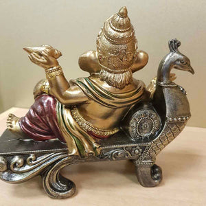 Ganesh Reclining on Peacock Seat (approx. 15x18cm)