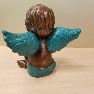 Brown Wash Angel with Teal Wings Blowing a Kiss