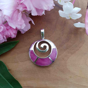 Ruby set in Koru Design Pendant (sterling silver)