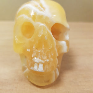 Orange Calcite Skull (approx. 6x7x4.5cm)
