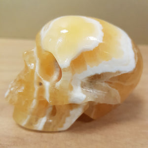 Orange Calcite Skull (approx. 6x7x4.5cm)