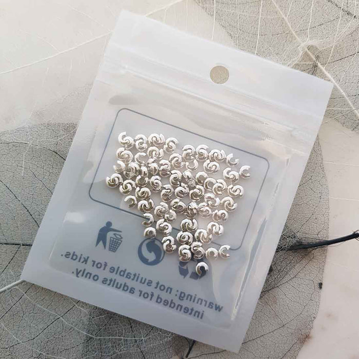 Silver Coloured Crimp Beads (pack of approx. 100. each is approx. 3mm diameter)
