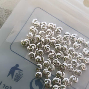 Silver Coloured Crimp Beads (pack of approx. 100. each is approx. 3mm diameter)