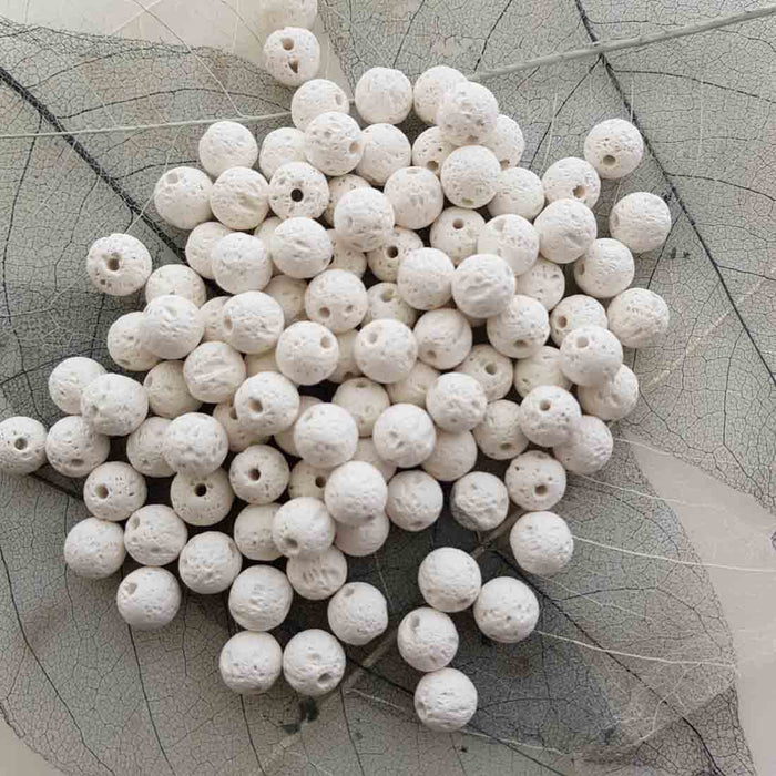 Unwaxed White Lava Bead (round. approx. 8mm )