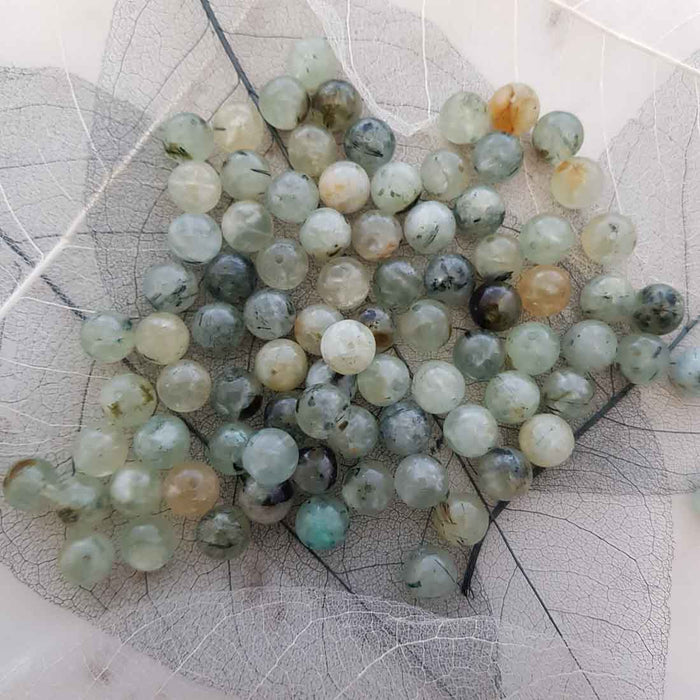 Prehnite Bead (assorted. round. approx. 8mm)