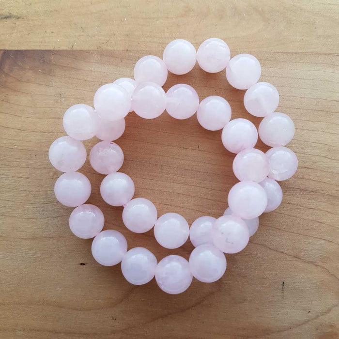 Rose Quartz Bracelet (assorted. approx. 10-11mm round beads)