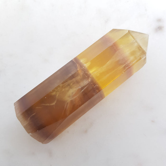 Gold & Purple Fluorite Polished Point (approx. 8.2x2.5x2.5cm)