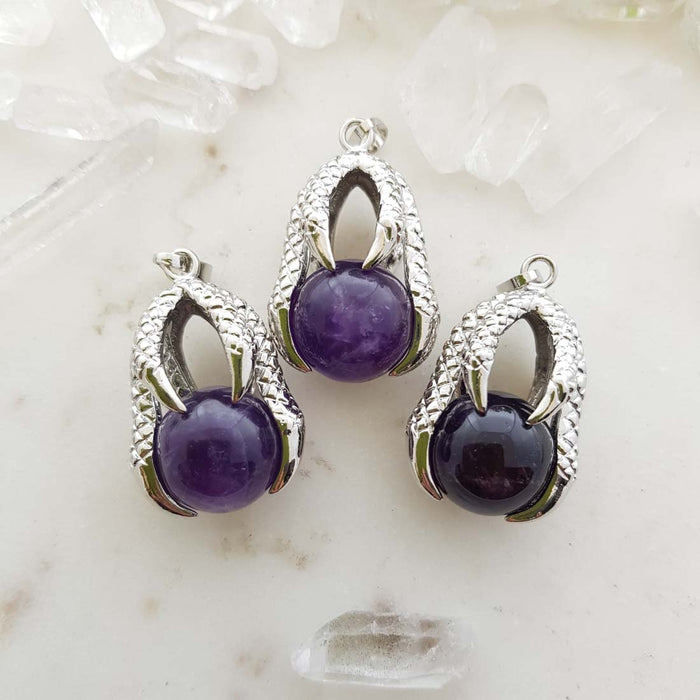 Amethyst Ball in Dragon's Claw Pendant (assorted. white metal)