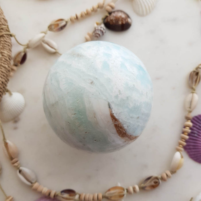 Caribbean Blue Calcite Sphere (approx. 7.5x7.5cm)