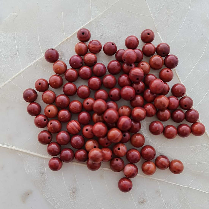 Rhodochrosite Bead from Brazil (assorted. approx. 8mm round)